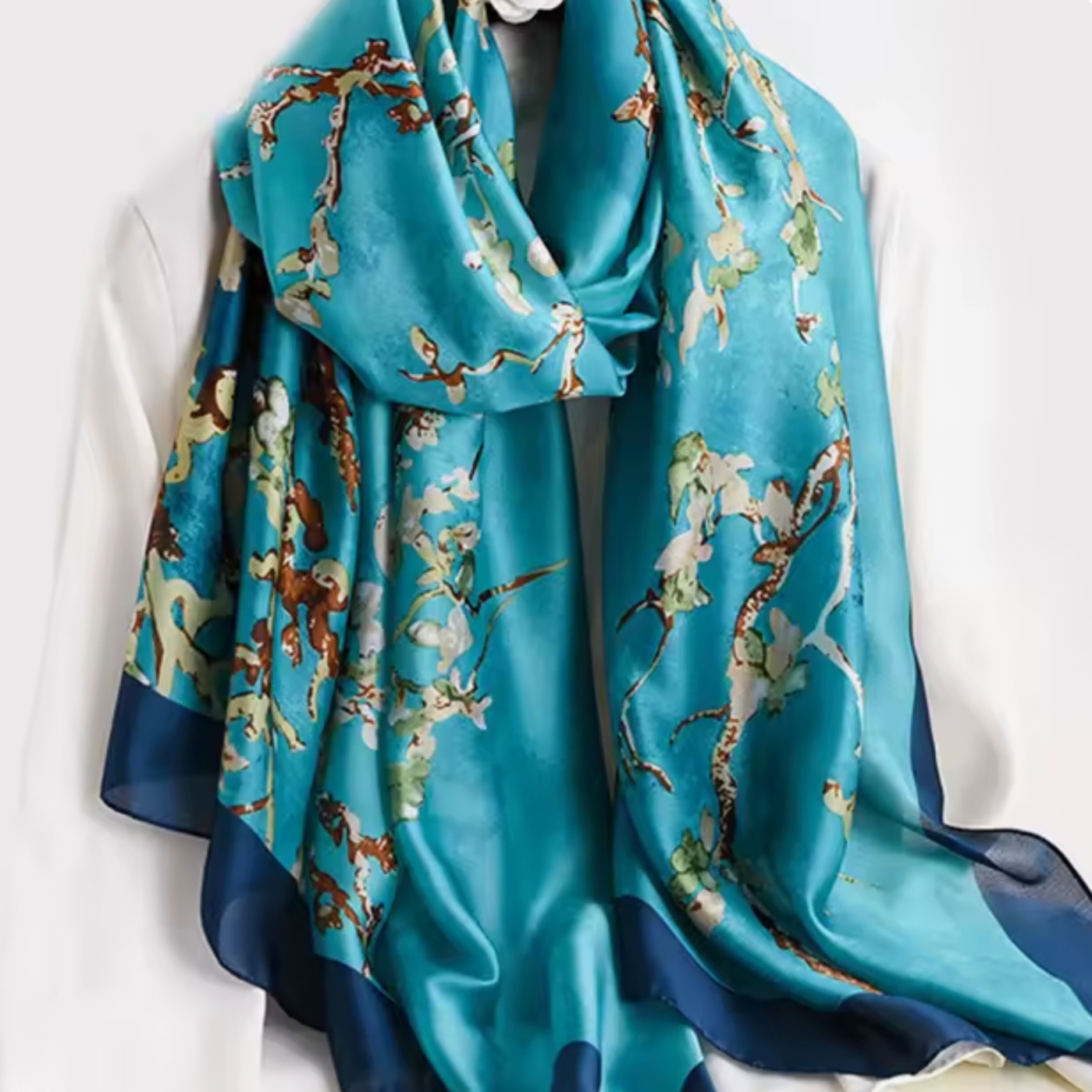 Elegant Blue And Green Silk Scarf With Floral Accents